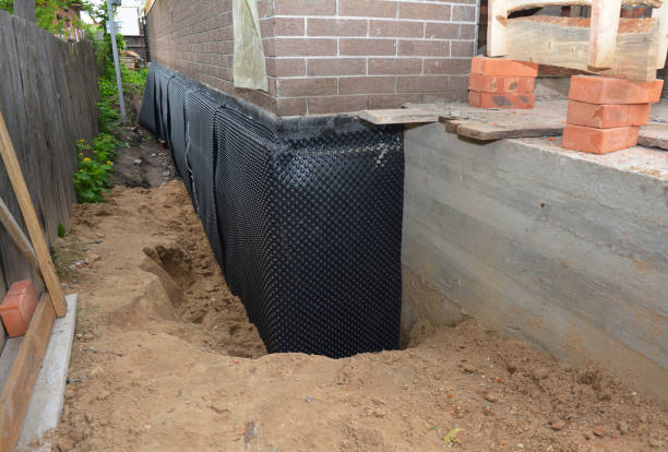 Happy homeowners after waterproofing job in West Berlin